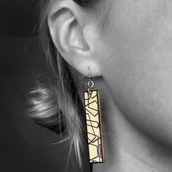 Long, Wood Drop Earrings with Layered Black Geometric Lines shown on model 